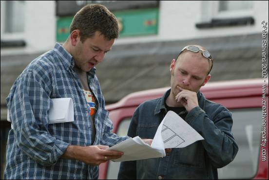 Simon Ricketts and Lionel Birnie confer over storyboards on The Car, the second short film they wrote together